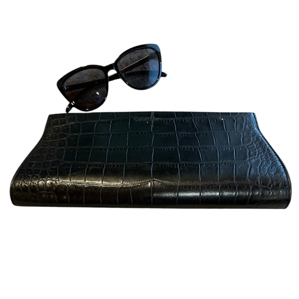 New Calvin Klein leather embossed clutch